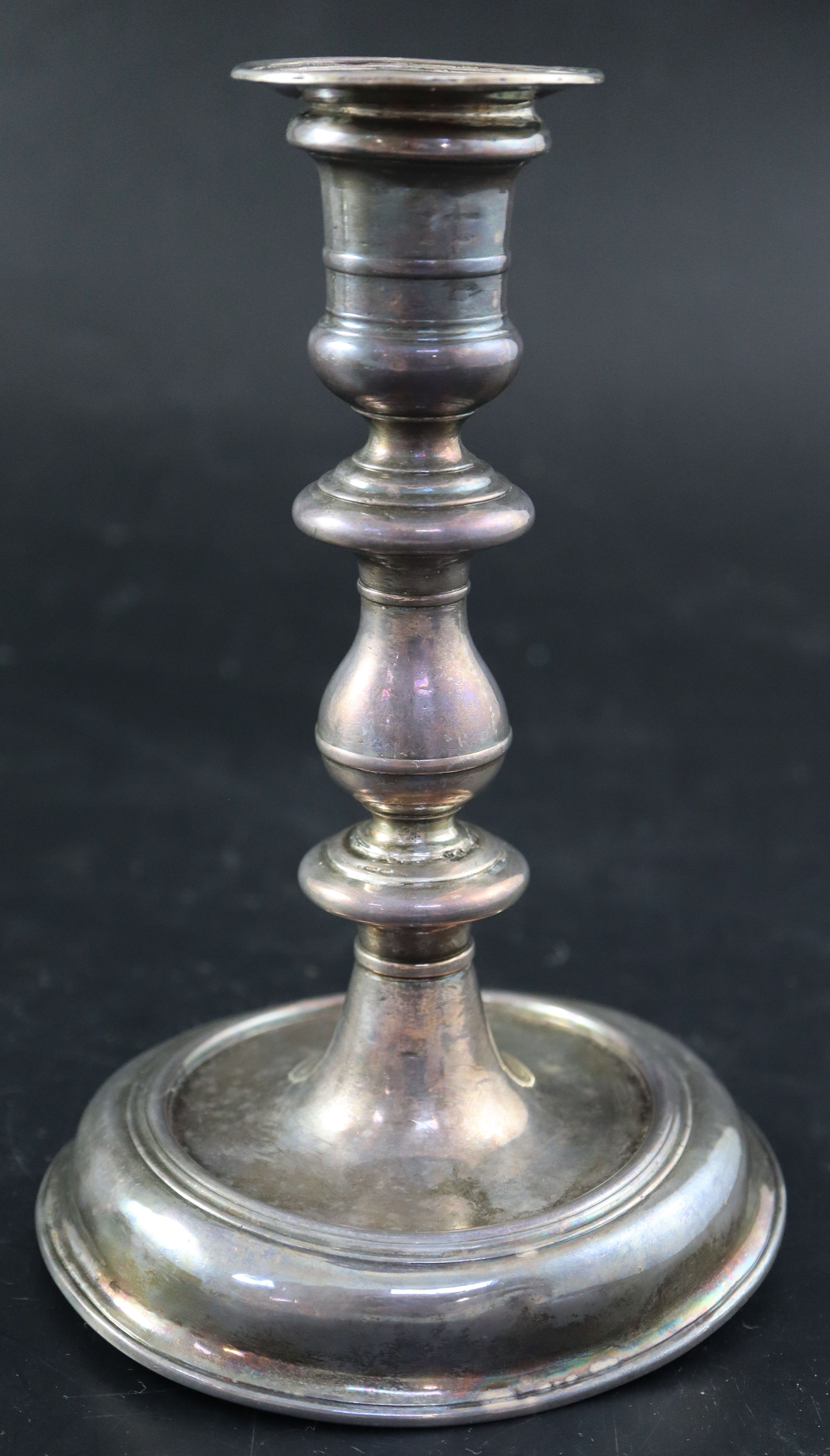 A Queen Anne silver candlestick, 19cm, 14.5oz.